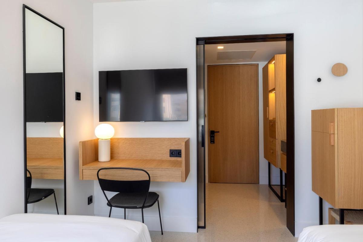 Cama o camas de una habitación en HM Palma Blanc