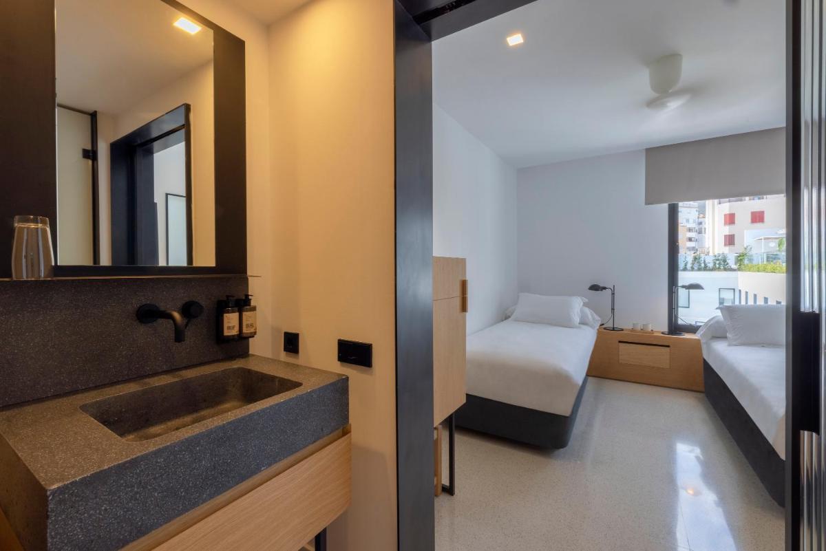 Cama o camas de una habitación en HM Palma Blanc