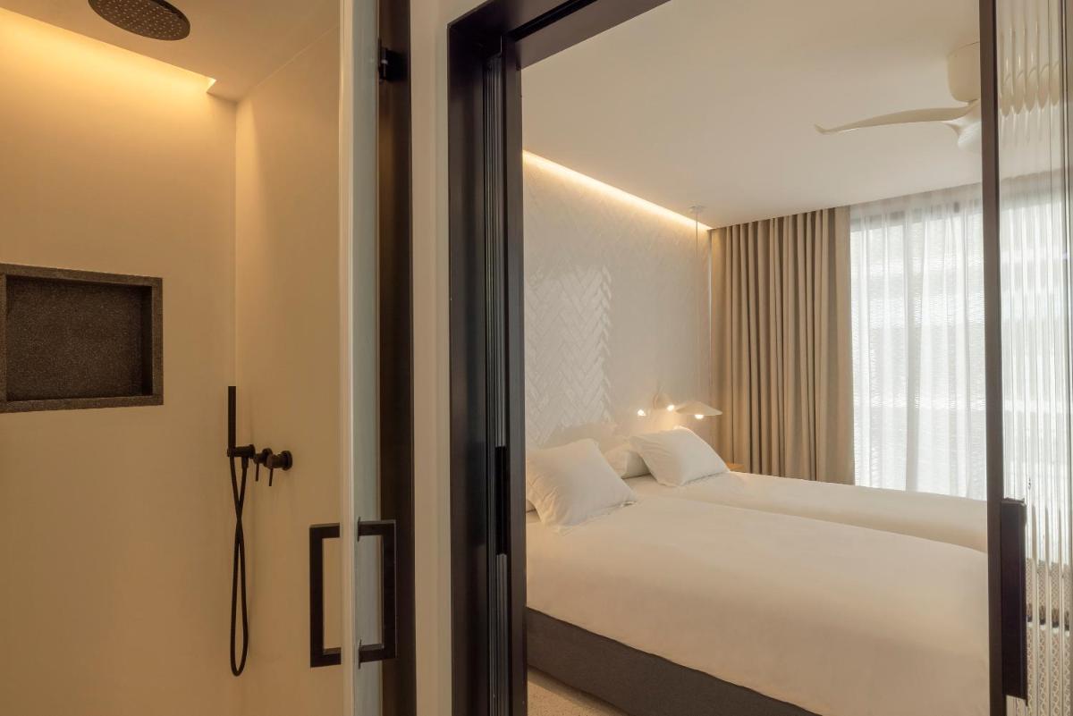 Cama o camas de una habitación en HM Palma Blanc