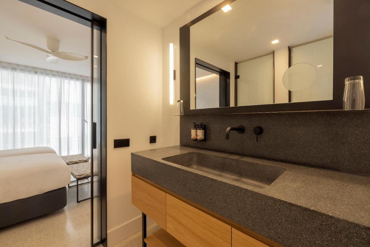 Cama o camas de una habitación en HM Palma Blanc