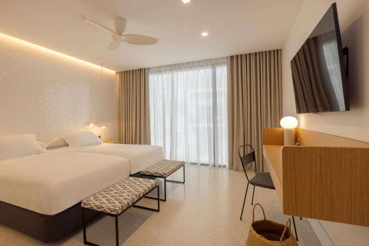 Cama o camas de una habitación en HM Palma Blanc