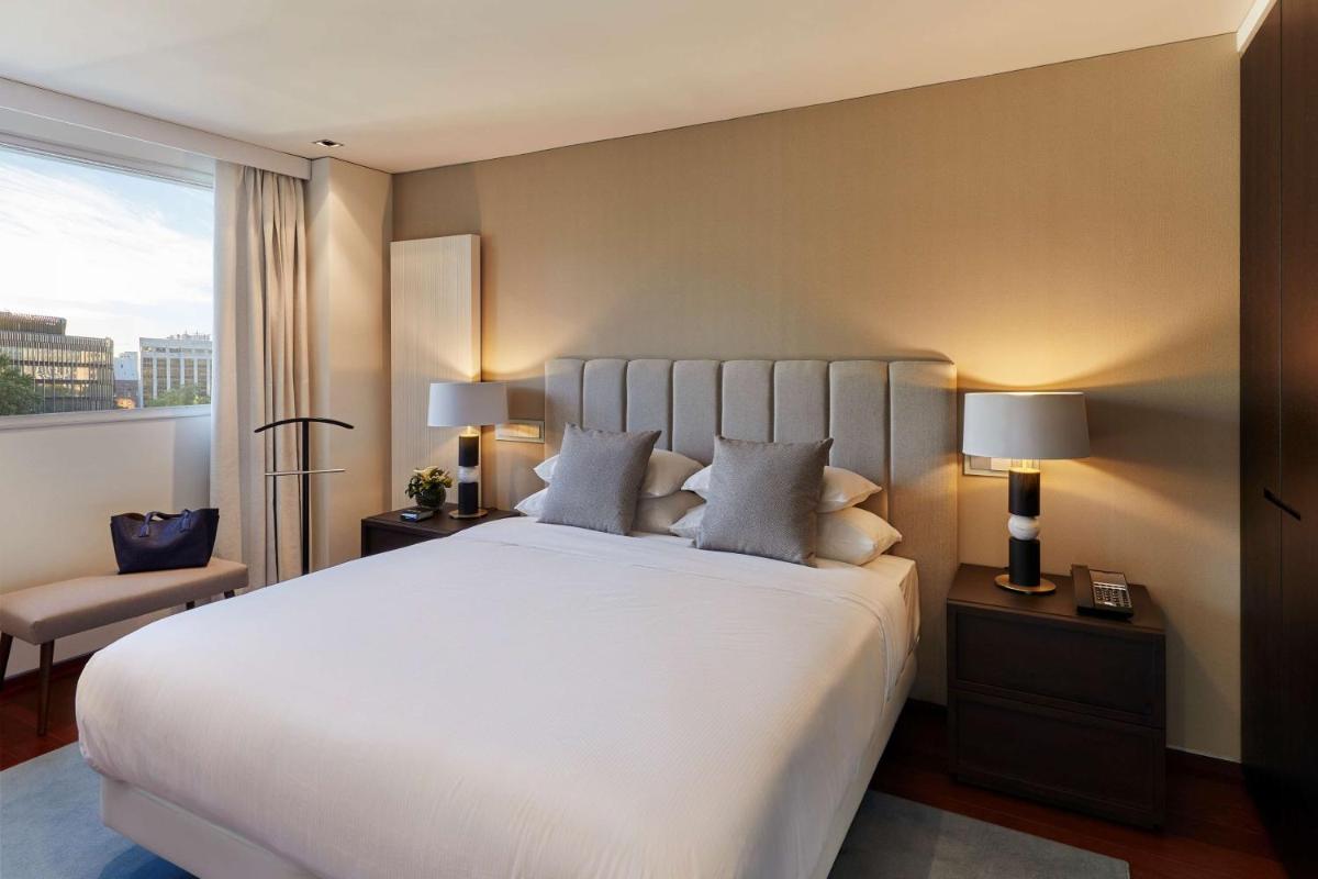 Cama o camas de una habitación en Hyatt Regency Madrid Residences