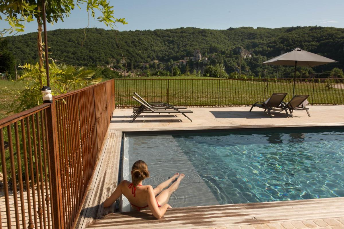 Piscine de l'établissement Hôtel-Spa Le Saint Cirq ou située à proximité