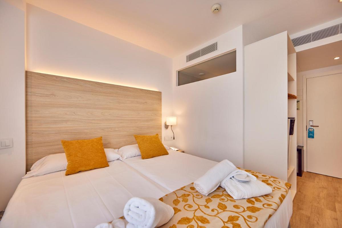 Cama o camas de una habitación en Hotel Ilusion Moreyo - Adults Only