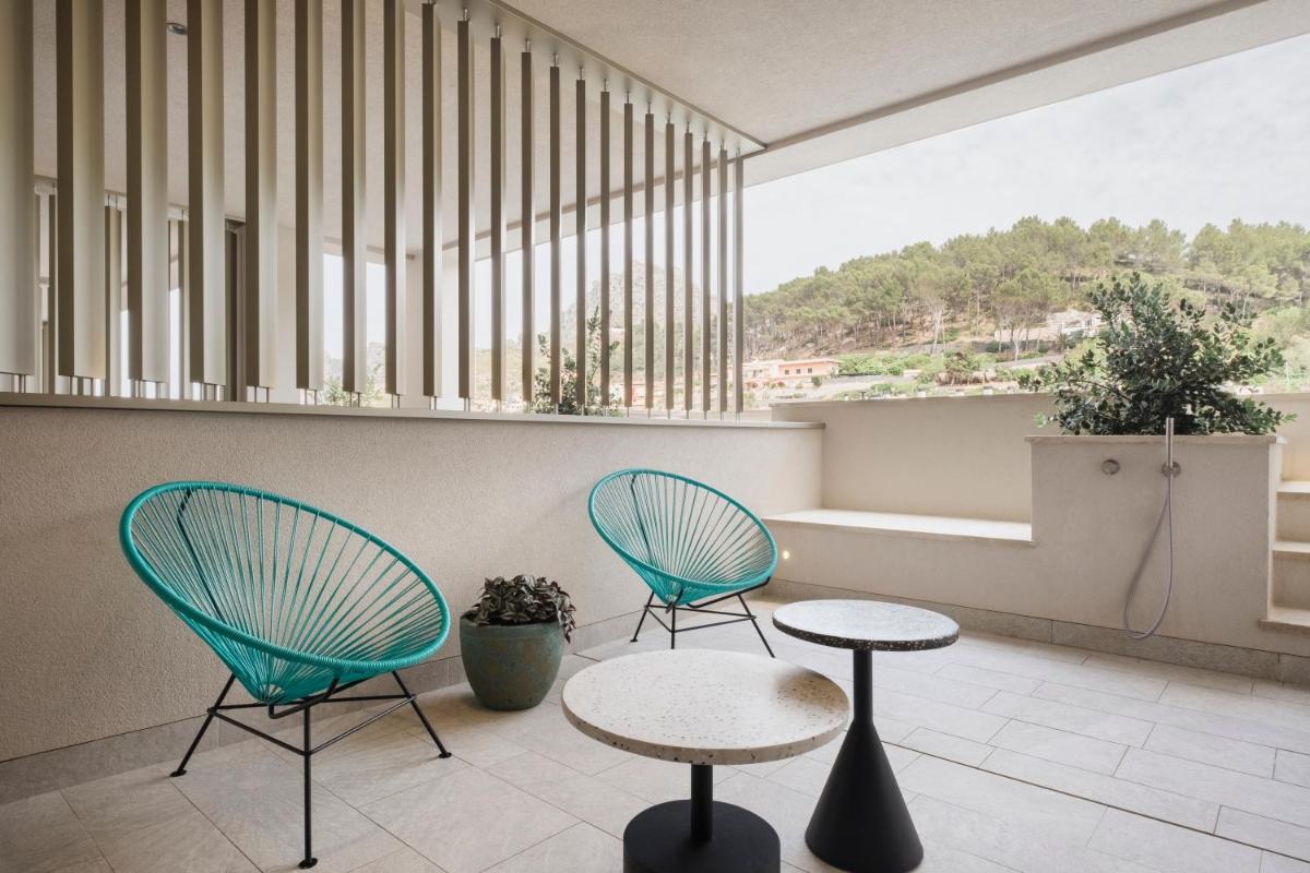 Un balcón o terraza de El Vicenç de la Mar - Adults Only - Over 12