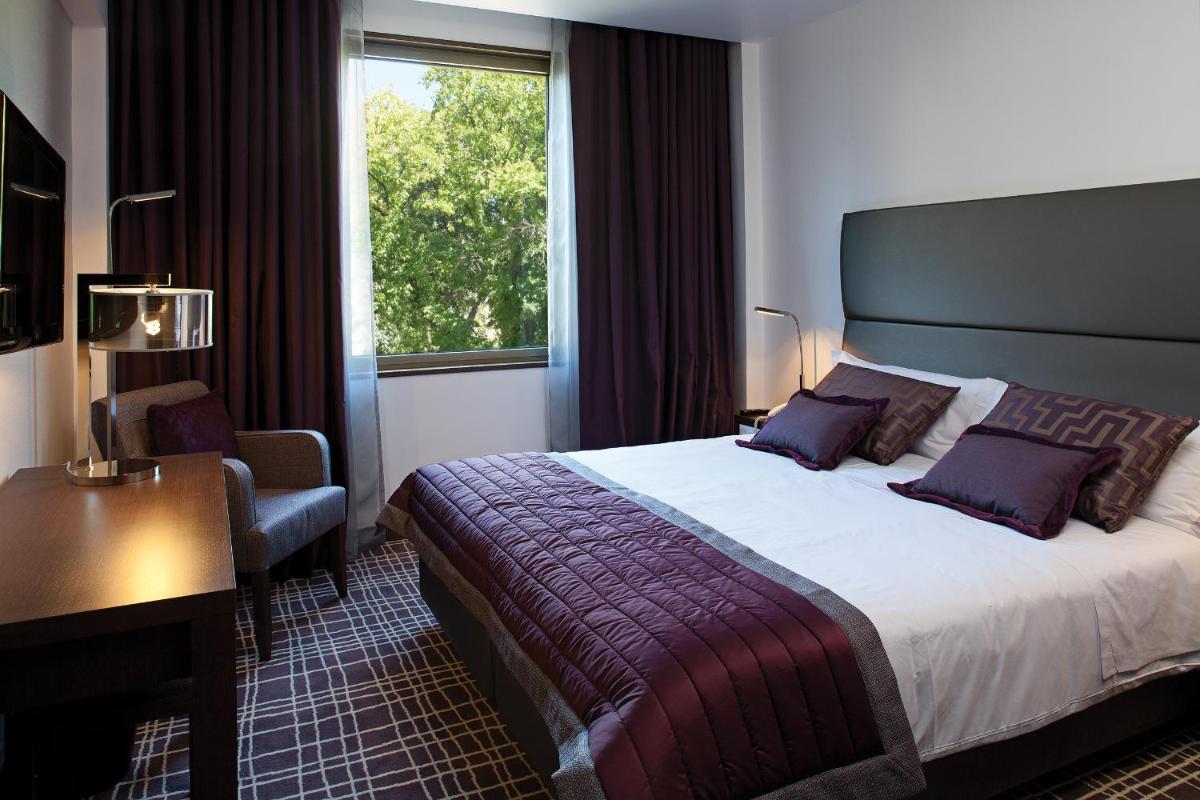 Uma cama ou camas num quarto em NEYA Lisboa Hotel