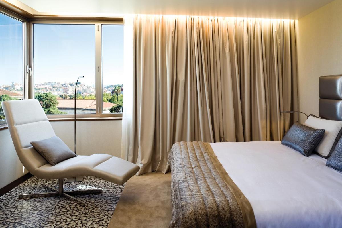 Uma cama ou camas num quarto em NEYA Lisboa Hotel