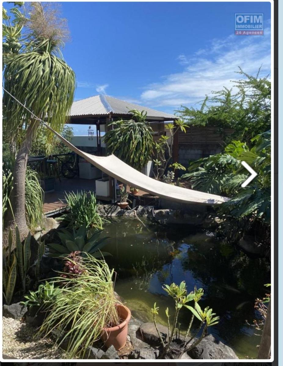 Belle villa familliale Possession avec vue mer et piscine - Housity