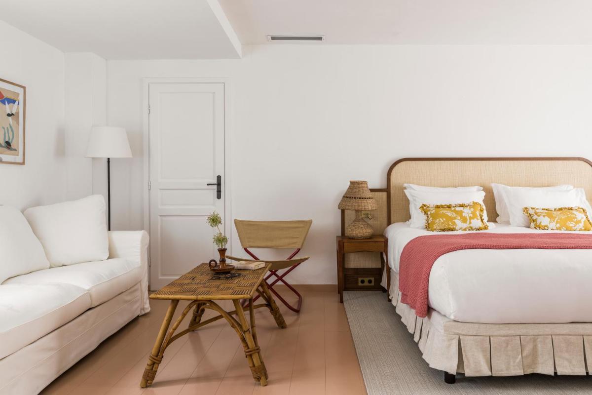 Un ou plusieurs lits dans un hébergement de l'établissement Hôtel La Tartane Saint-Tropez