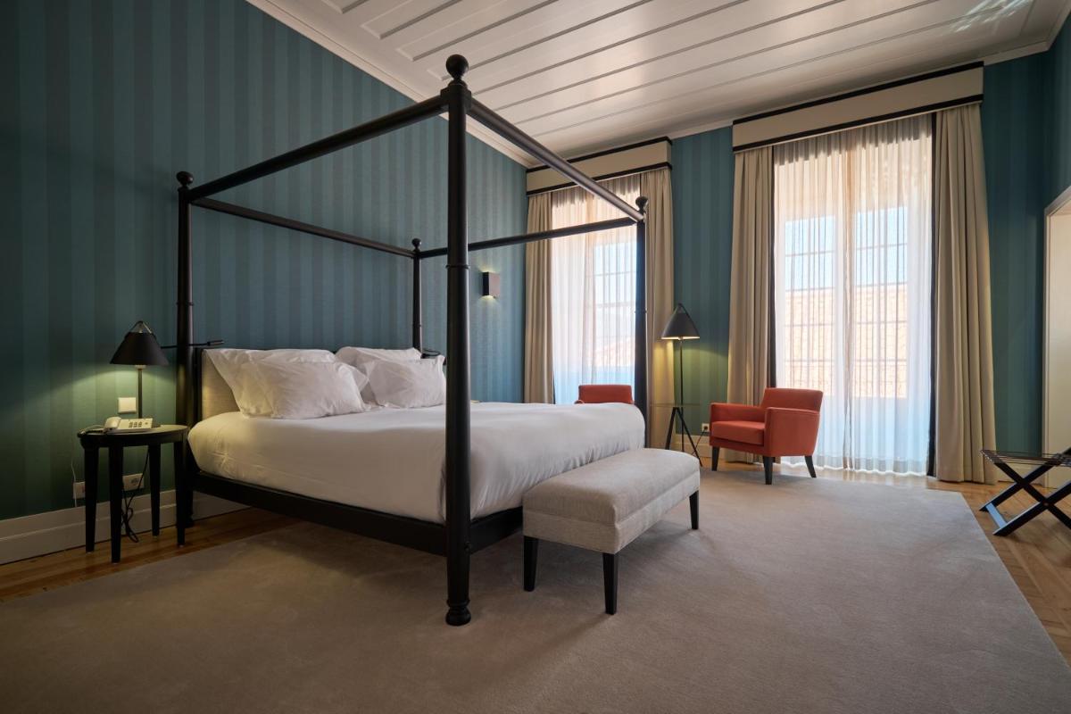 Uma cama ou camas num quarto em Octant Lousa