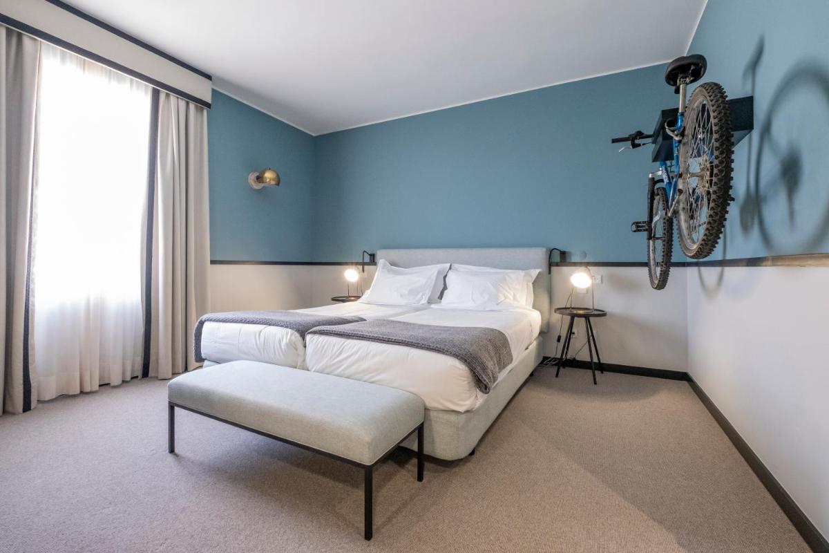 Uma cama ou camas num quarto em Octant Lousa