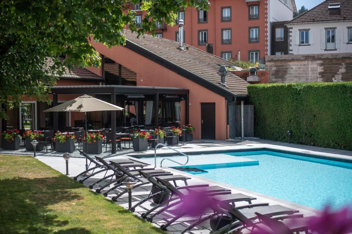 Piscine de l'établissement Le Grand Hotel & Spa ou située à proximité