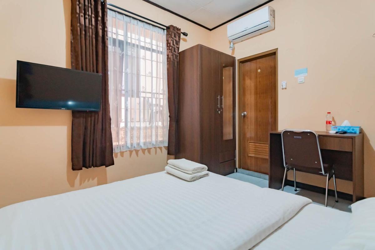 Shofy Guest House Mitra RedDoorz - Housity