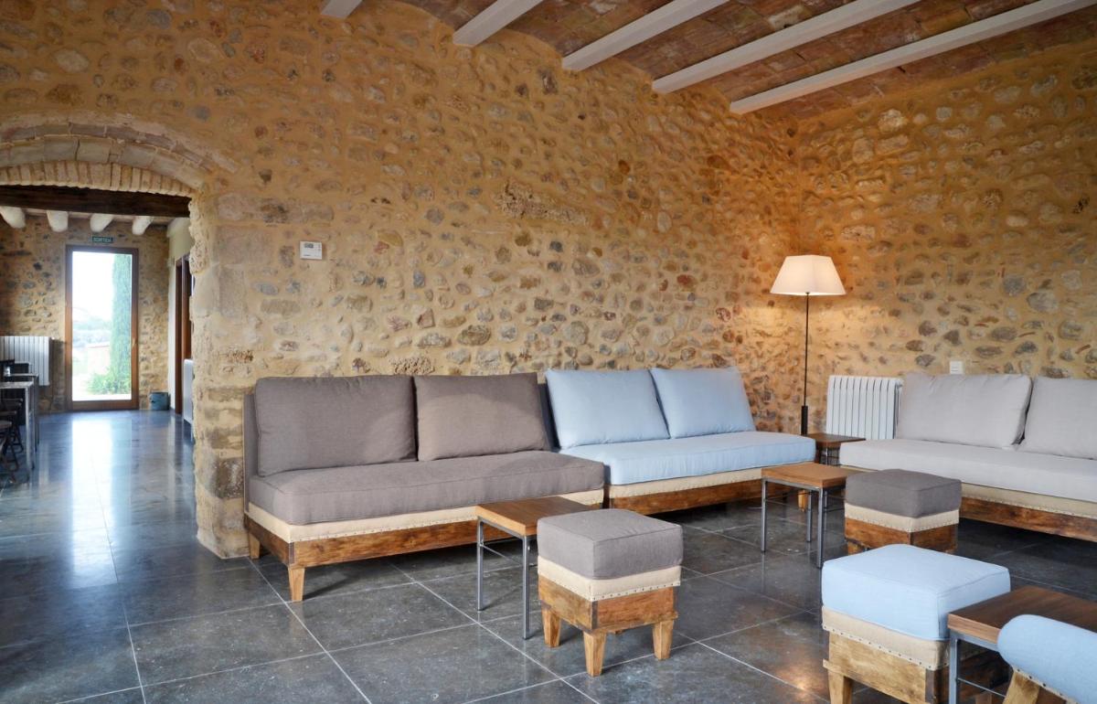 Zona de estar de Casa Anamaria Hotel