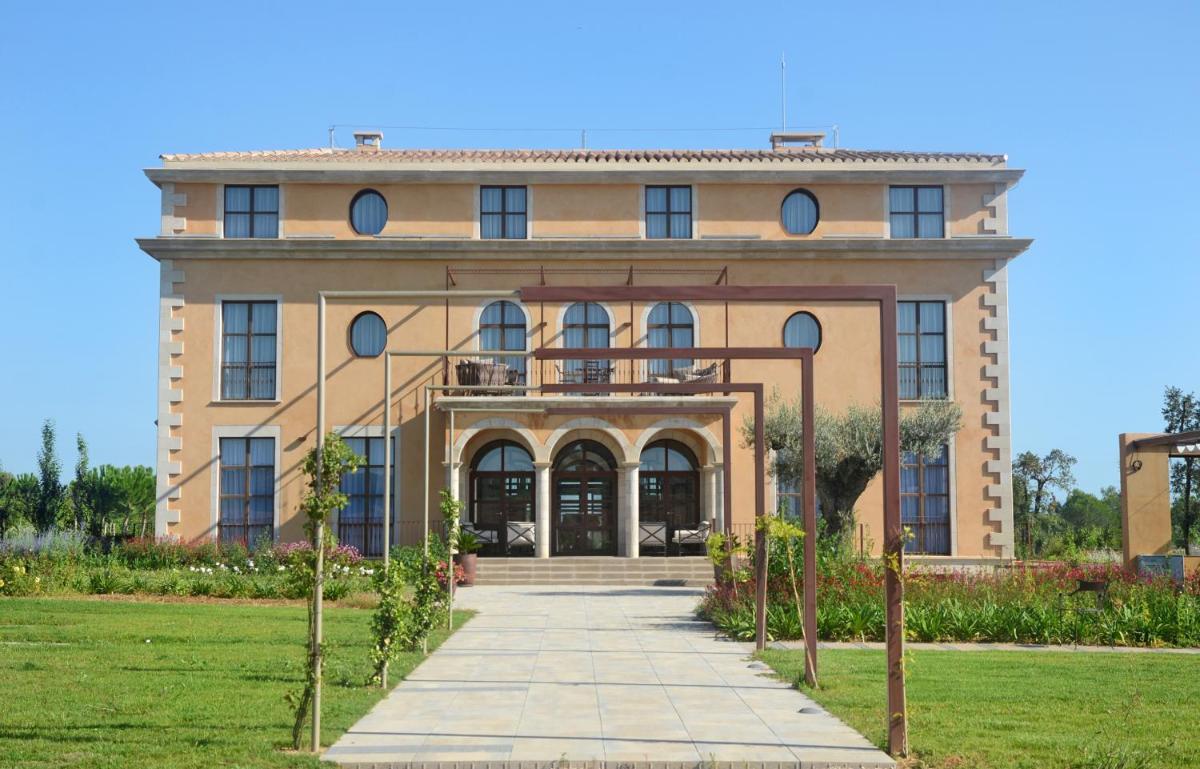 Jardín al aire libre en Casa Anamaria Hotel