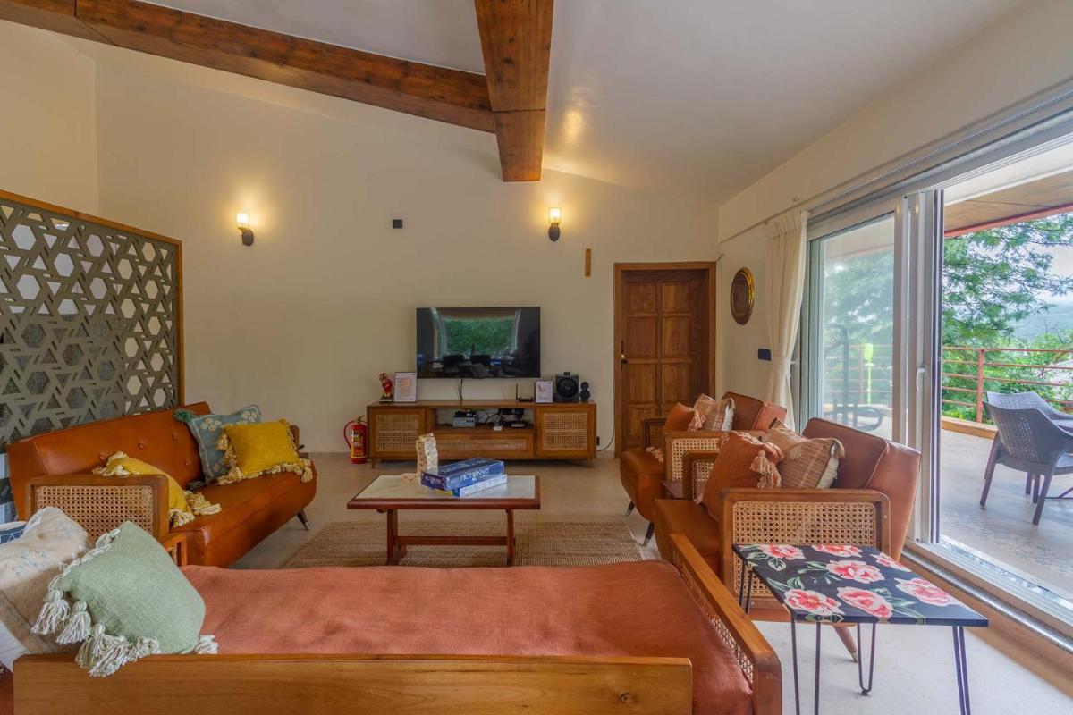 StayVista's Beyond The Blue Door - Valley-View Villa with Outdoor Jacuzzi & Massage Chair - Housity