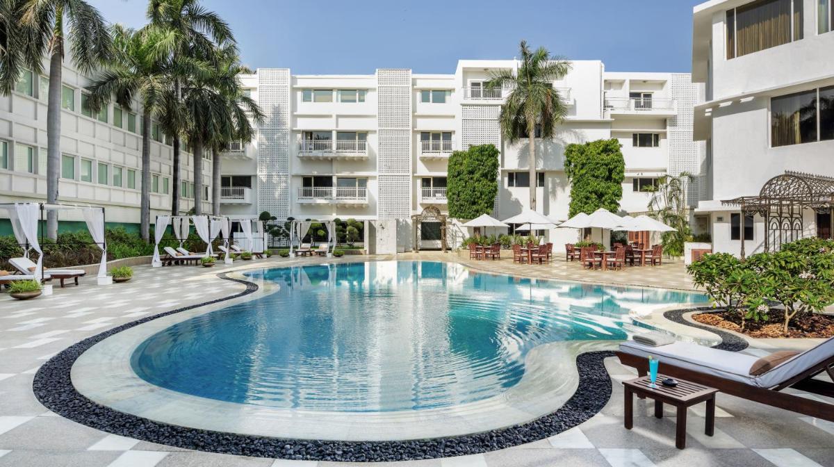 an image of a swimming pool at a hotel at The Claridges New Delhi in New Delhi an image of a swimming pool at a hotel at The Claridges New Delhi in New Delhi