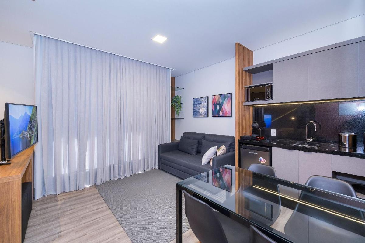 AION suítes 204 - Compacto e luxuoso Loft - Rooftop com piscina e academia - À poucos passos da praia - Housity