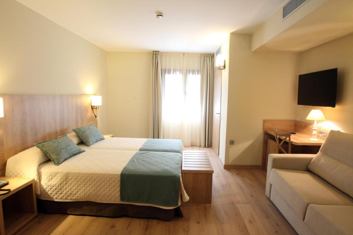 Cama o camas de una habitación en Hotel & Spa Real Villa Anayet