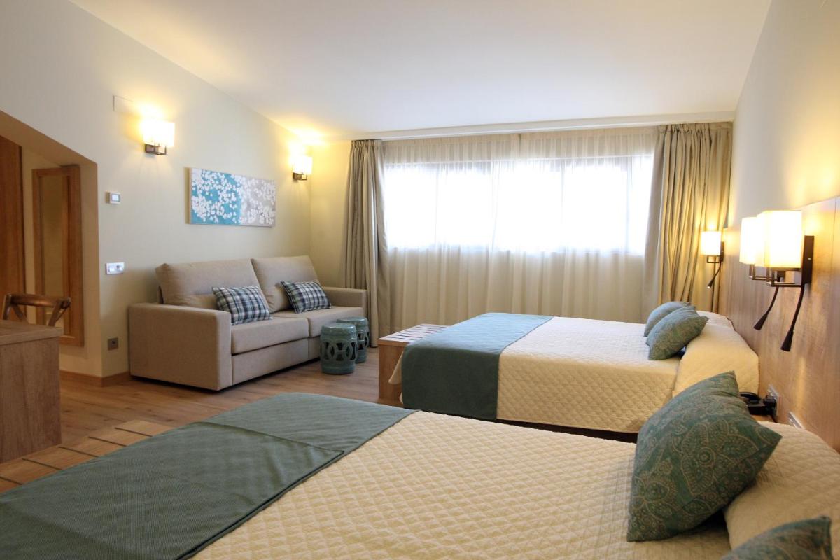 Cama o camas de una habitación en Hotel & Spa Real Villa Anayet