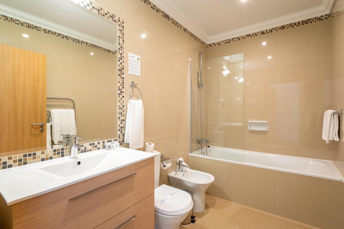Uma casa de banho em Boavista Golf & Spa - Bela Colina Holidays
