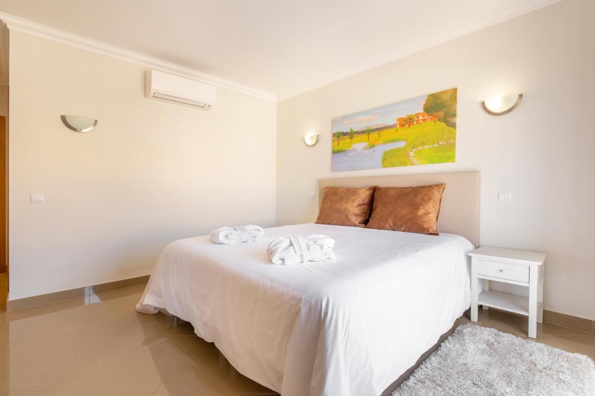 Uma cama ou camas num quarto em Boavista Golf & Spa - Bela Colina Holidays
