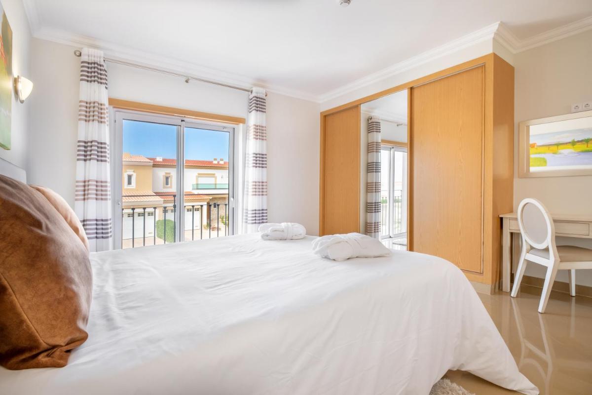 Uma cama ou camas num quarto em Boavista Golf & Spa - Bela Colina Holidays