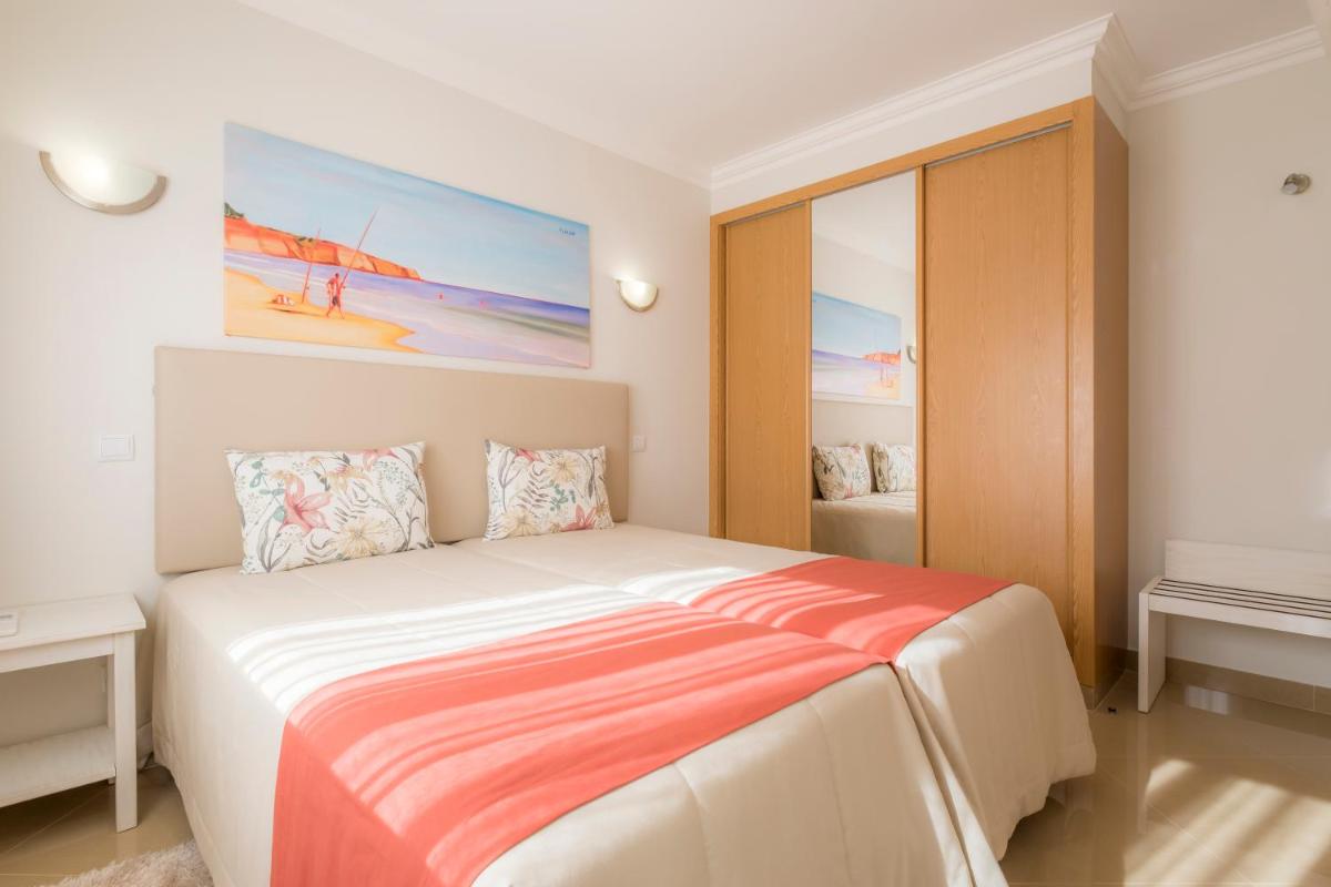 Uma cama ou camas num quarto em Boavista Golf & Spa - Bela Colina Holidays