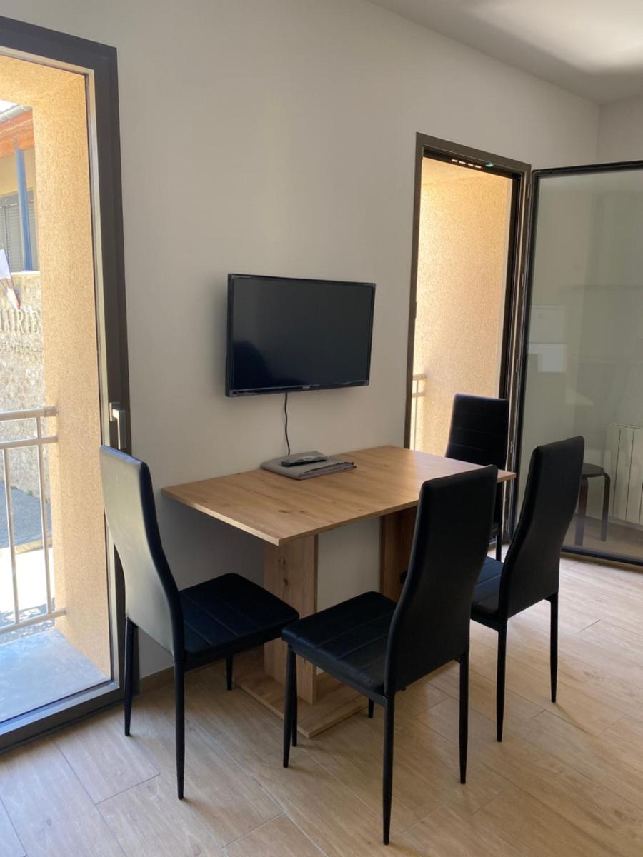 Appartements neufs avec garages dans maison de village - Hizvo