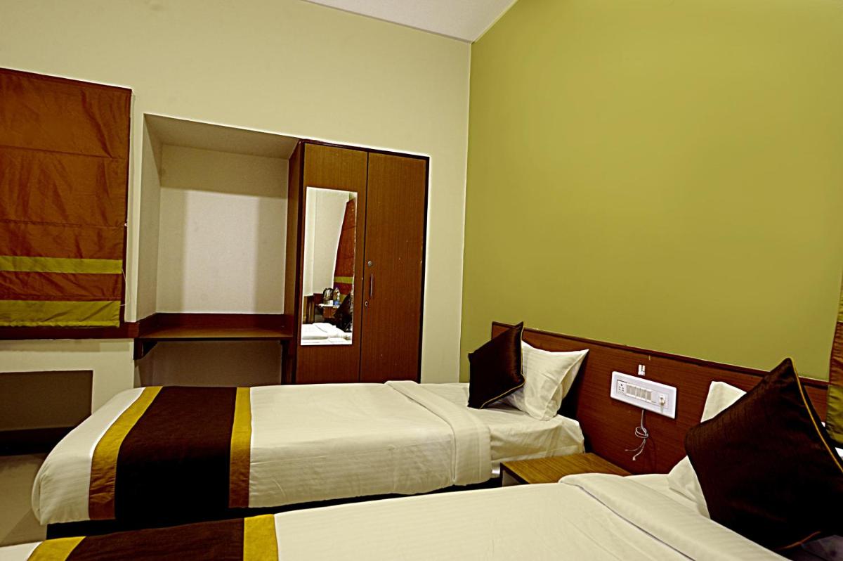 Bisque Transit Suites - Bangalore Airport Road - Housity