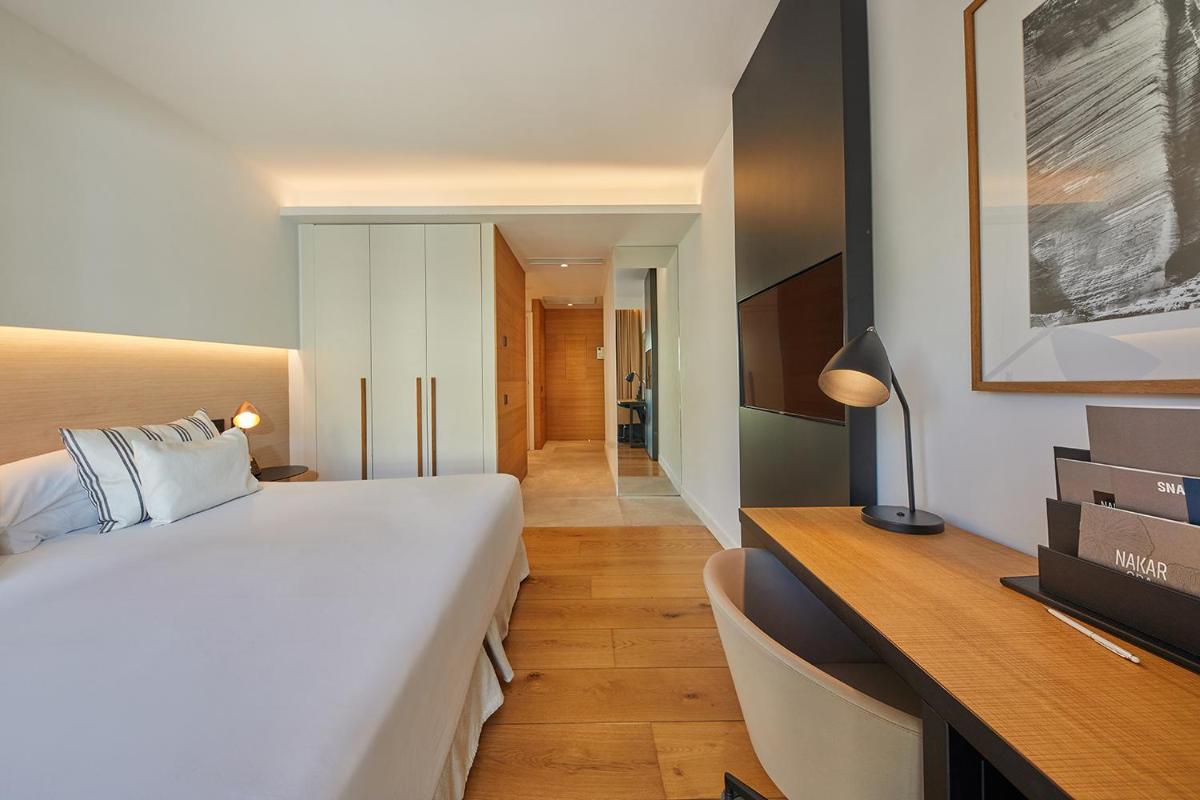 Cama o camas de una habitación en Nakar Hotel