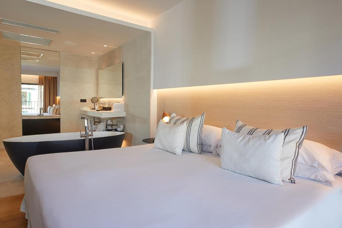 Cama o camas de una habitación en Nakar Hotel
