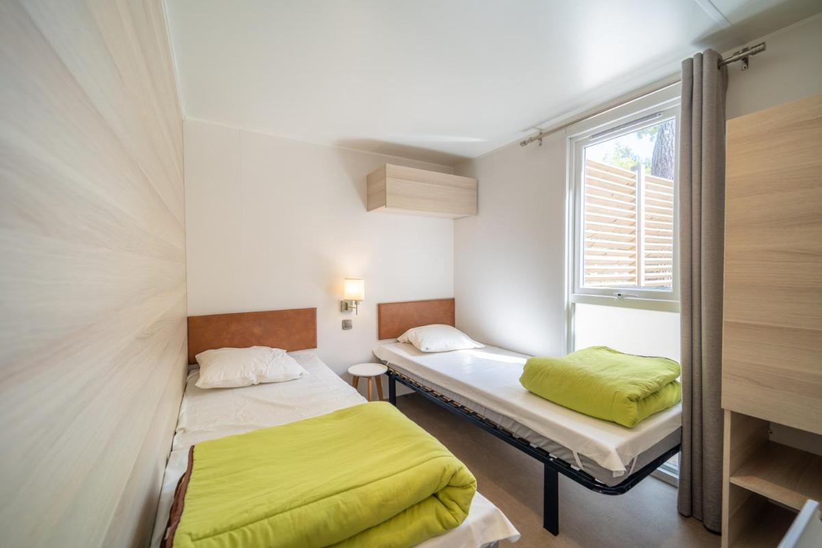 Camping Les Genêts - Housity