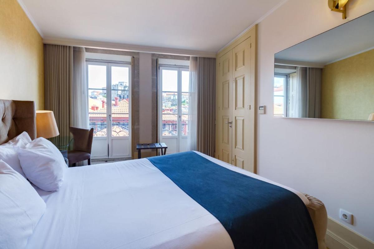 Uma cama ou camas num quarto em Oca Flores Hotel Boutique