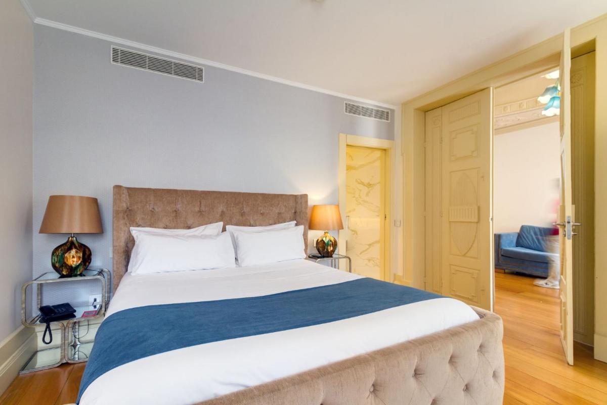 Uma cama ou camas num quarto em Oca Flores Hotel Boutique