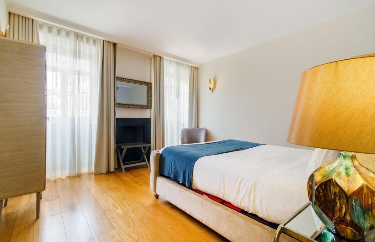 Uma cama ou camas num quarto em Oca Flores Hotel Boutique
