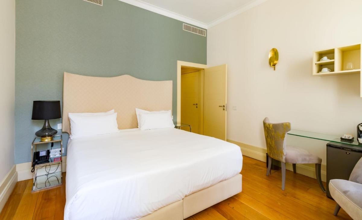Uma cama ou camas num quarto em Oca Flores Hotel Boutique