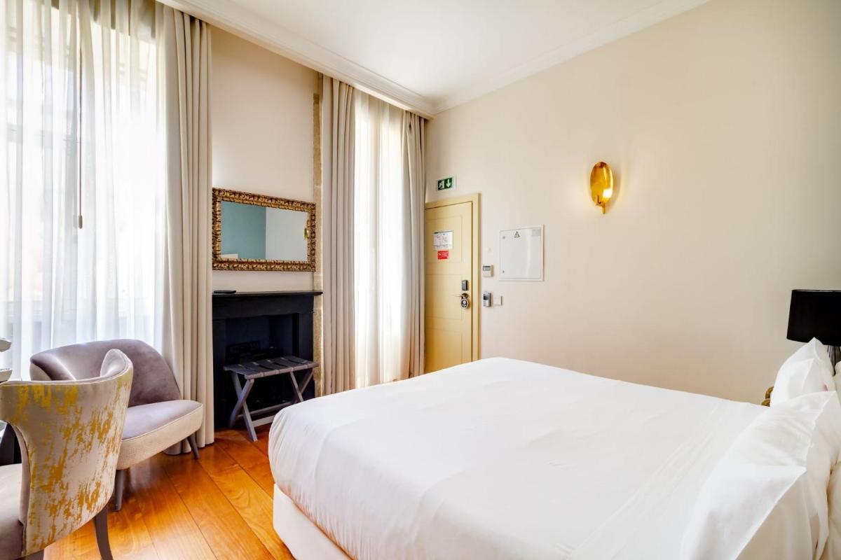 Uma cama ou camas num quarto em Oca Flores Hotel Boutique