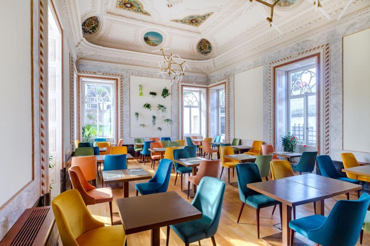Uma área de estar em Oca Flores Hotel Boutique