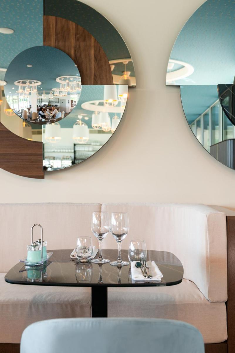 Restaurant ou autre lieu de restauration dans l'établissement Hôtel Omnubo Collection