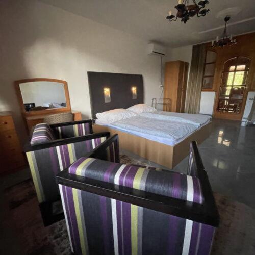 Fészek Apartmanok - Housity