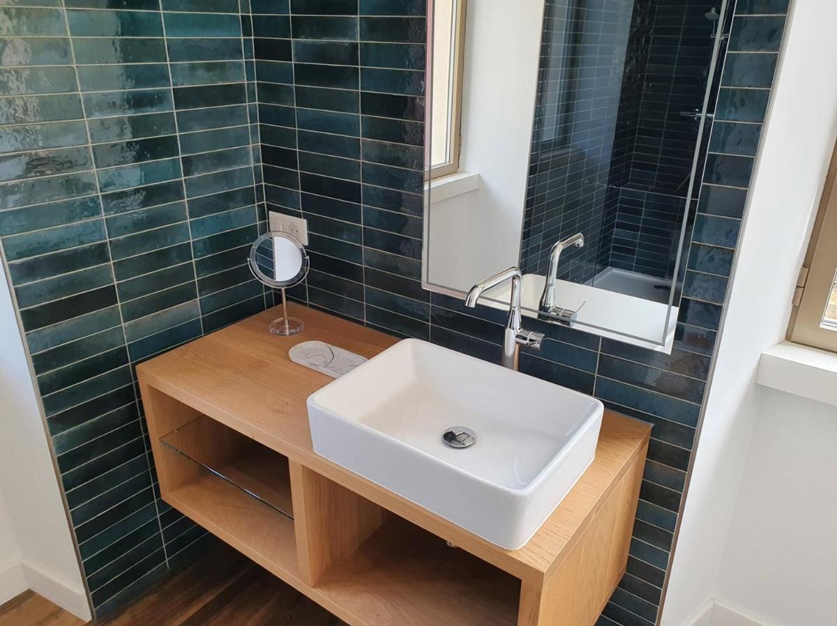 Salle de bains dans l'établissement Hôtel Casale Olmia