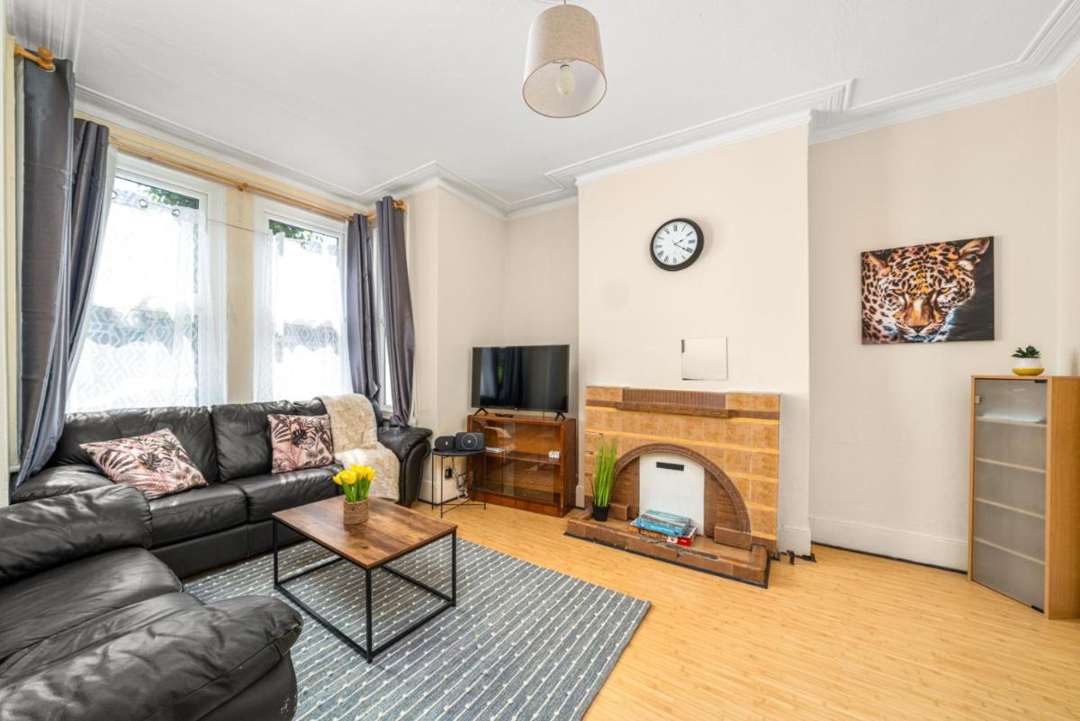 Homely 4-bedroom home with 2 baths & free parking - Housity