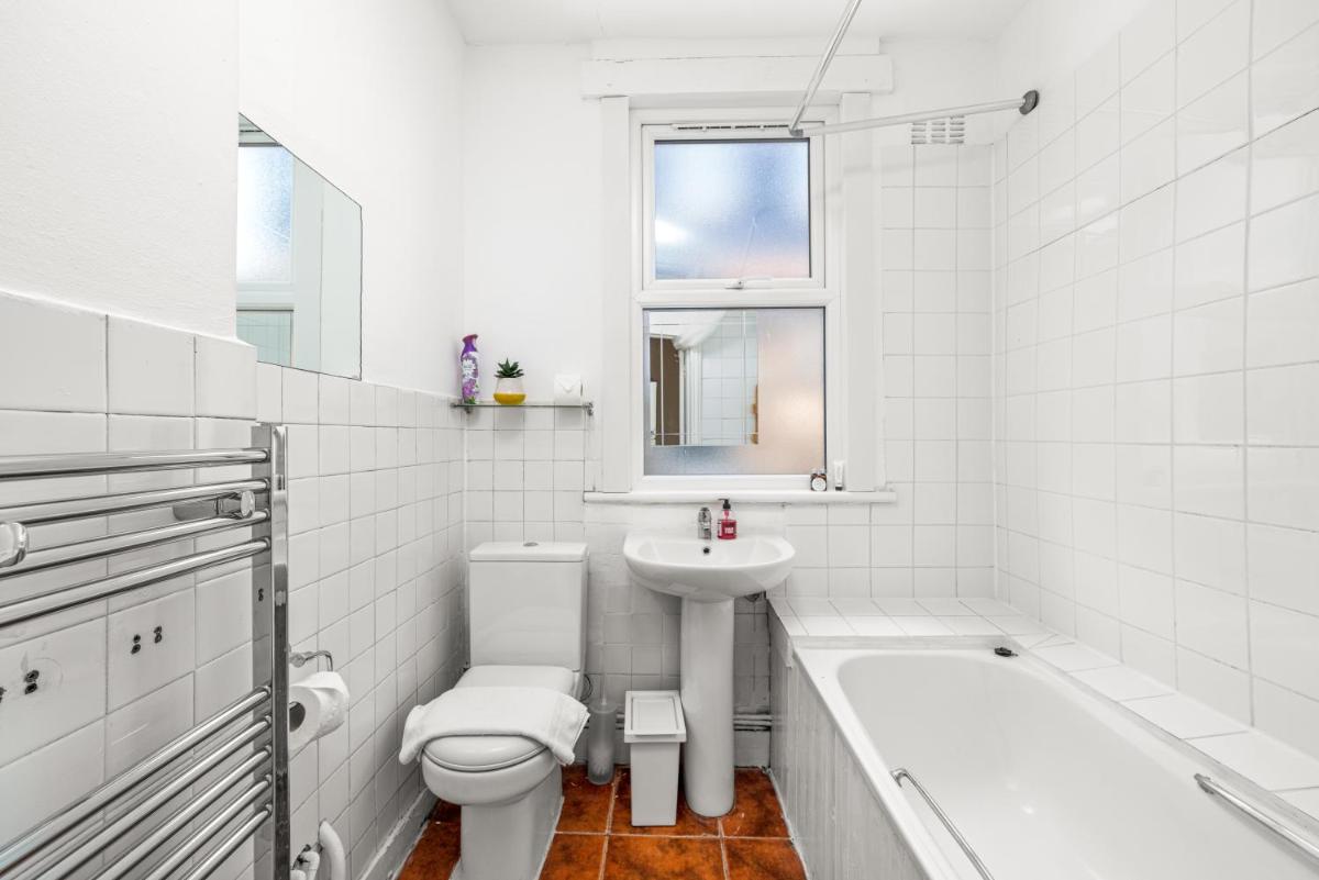 Homely 4-bedroom home with 2 baths & free parking - Housity