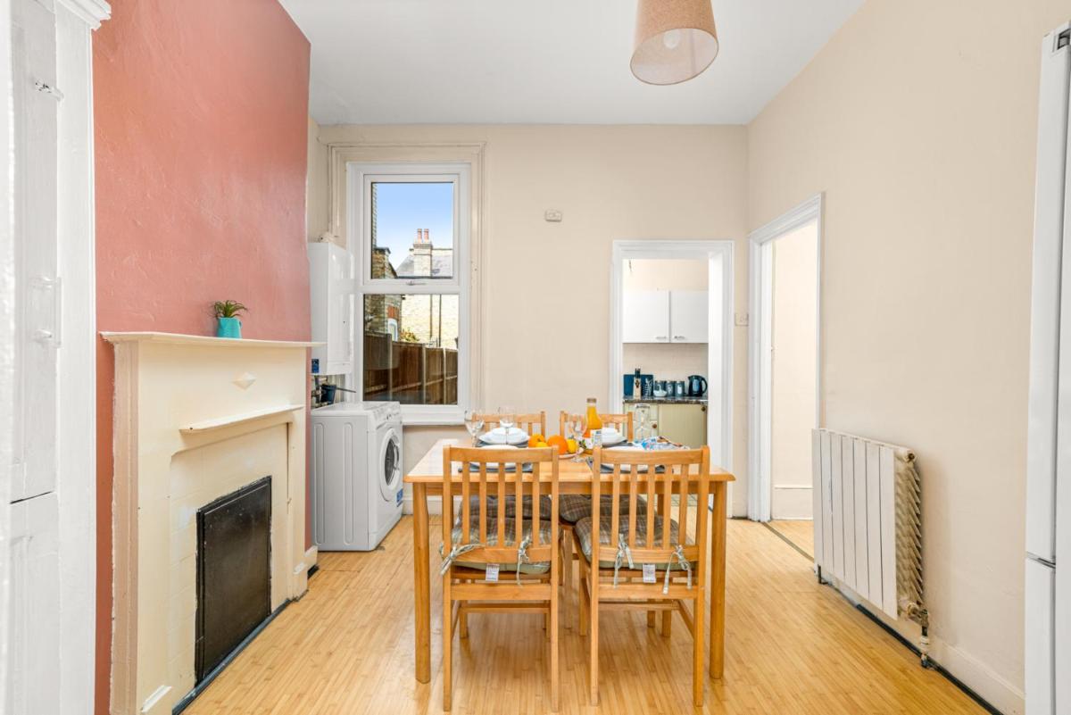 Homely 4-bedroom home with 2 baths & free parking - Housity