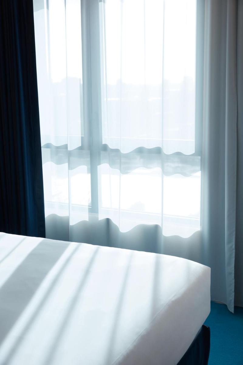Un ou plusieurs lits dans un hébergement de l'établissement SO/ Paris Hotel