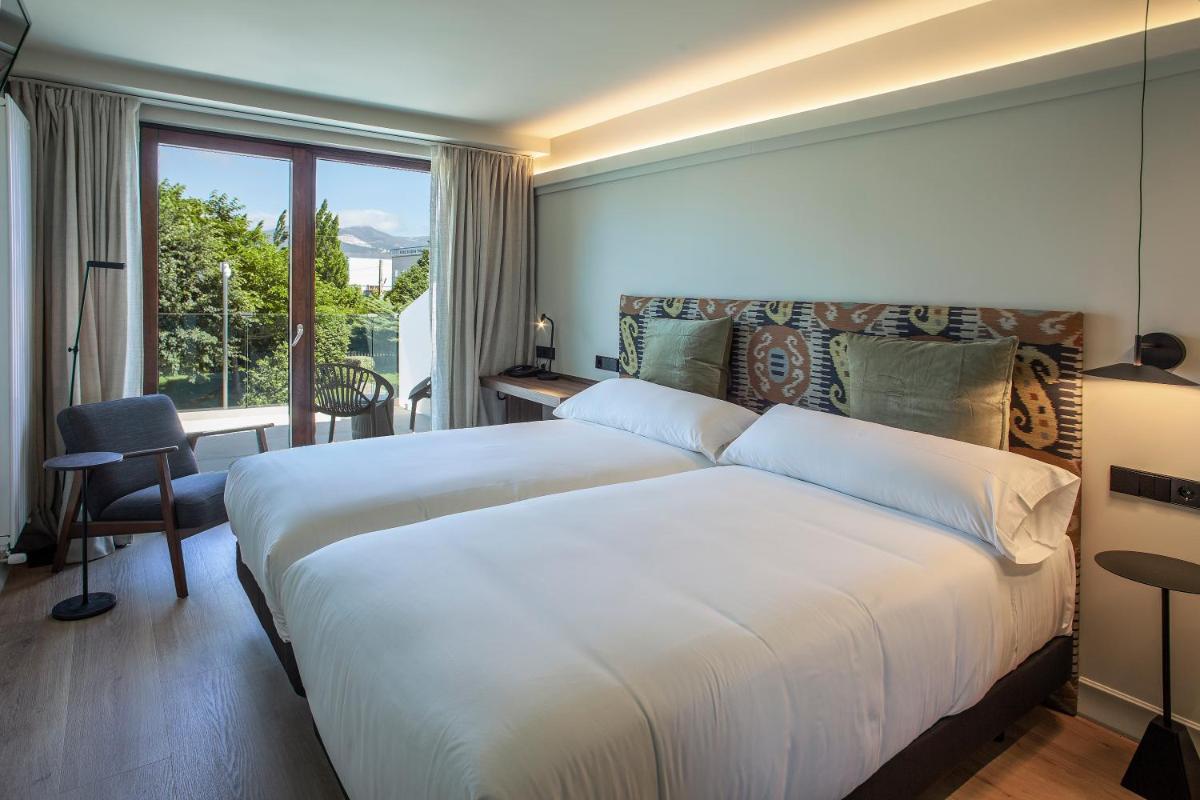 Cama o camas de una habitación en Blanco Hotel Spa