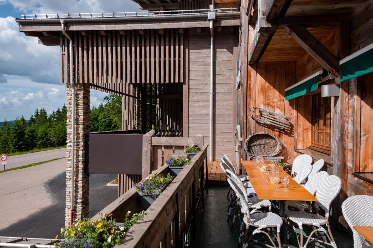 Balcon ou terrasse dans l'établissement Chalet Hôtel & Spa Le Collet
