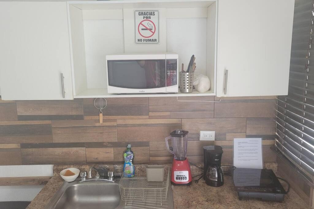 Departamento CENTRICO, Tv smart, minisplit nuevo, wifi 100 mb, cocina, lavadora, asador, parking, letra i - Housity