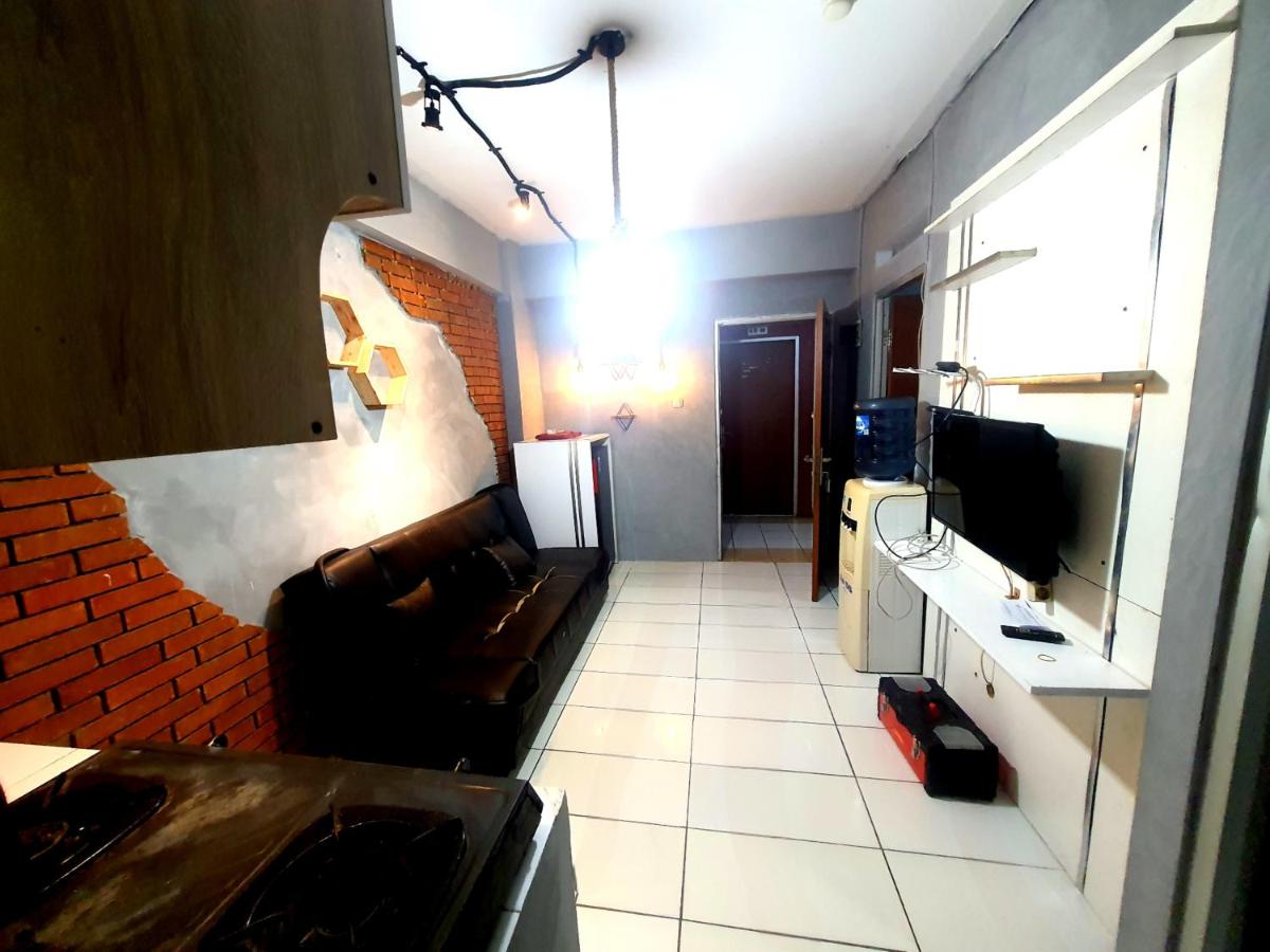 Cibubur Village Apartment by Sang Living - Housity